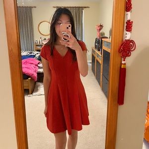 Reddish-orange flowy dress